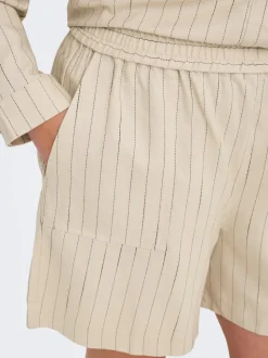 CARMONICA Mid waist Loose fit Chino shorts